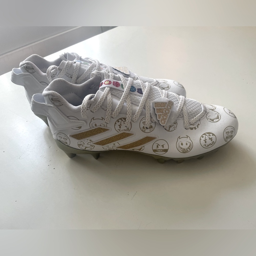 Men's Freak emoji football cleats in gold by Adidas - size 9